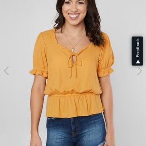 Yellow shirt from buckle
